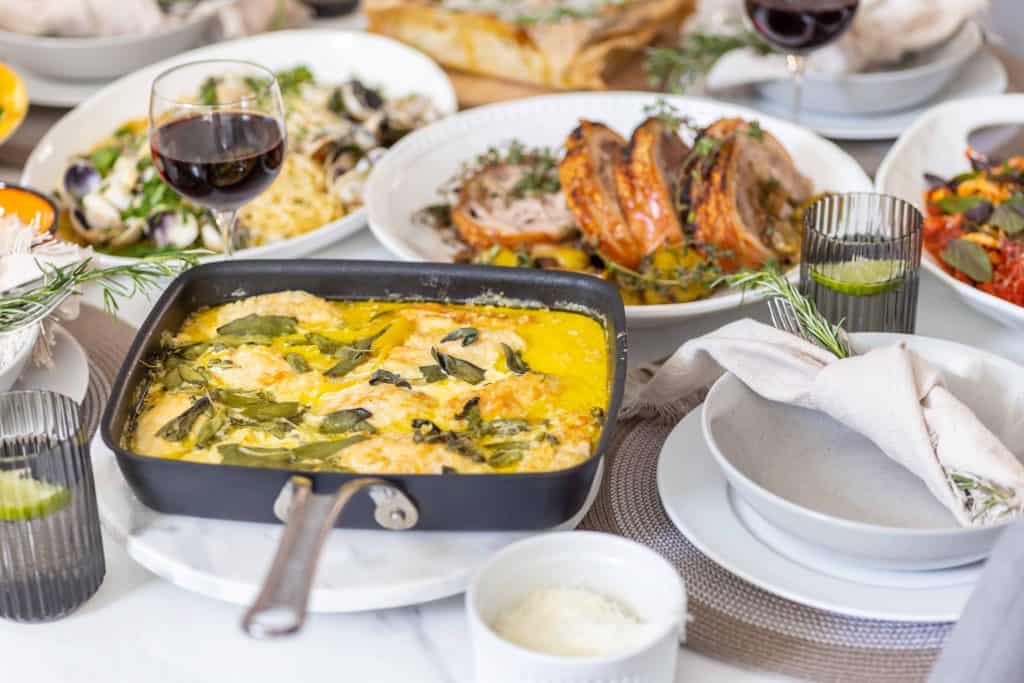 Dinner table filled with plates of food